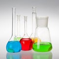 Laboratory glassware with liquids of different colors Royalty Free Stock Photo