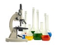 Laboratory metal microscope and test tubes with liquid isolated Royalty Free Stock Photo