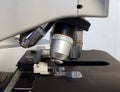 Laboratory microscope with different lenses closeup. Scientific and healthcare research background Royalty Free Stock Photo