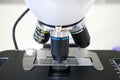 Laboratory microscope with different lenses closeup. Scientific and healthcare research background Royalty Free Stock Photo