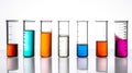 laboratory multi-colored samples of bacteria and microorganisms in transparent glass test tubes, isolated white background Royalty Free Stock Photo