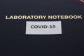 Laboratory Notebook for research data on coronavirus Royalty Free Stock Photo