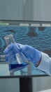 Laboratory scientist analyzing chemical glass beaker Royalty Free Stock Photo