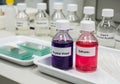Laboratory setting with bottles of dyes Royalty Free Stock Photo