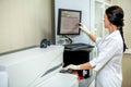 Laboratory Specialist Introduces Settings for Blood Testing Apparatus