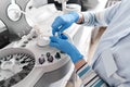 Laboratory technician working with a centrifuge machine Royalty Free Stock Photo