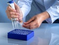 Laboratory Technician Handling Test Tubes and Equipment Royalty Free Stock Photo