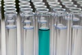 Laboratory test tubes with blue liquid sample Royalty Free Stock Photo