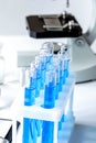 Laboratory work with microscope top view Royalty Free Stock Photo