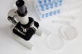 Laboratory work with microscope top view Royalty Free Stock Photo