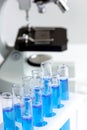 Laboratory work with microscope top view Royalty Free Stock Photo