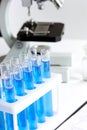 Laboratory work with microscope top view Royalty Free Stock Photo