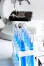 Laboratory work with microscope top view Royalty Free Stock Photo