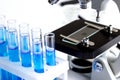 Laboratory work with microscope top view Royalty Free Stock Photo