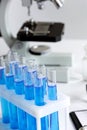 Laboratory work with microscope top view Royalty Free Stock Photo