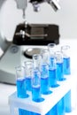 Laboratory work with microscope top view Royalty Free Stock Photo