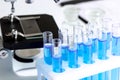 Laboratory work with microscope top view Royalty Free Stock Photo