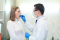 Laboratory worker performing DNA paternity test in a medical laboratory. Implementation of DNA sampling in humans