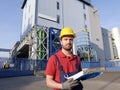 Laborer outside a factory working Royalty Free Stock Photo