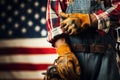 Laborer with toolbelt, gloves, measure embodies Labor Day spirit against US flag