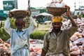 Laborers carrying rock salt Royalty Free Stock Photo