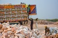 Laborers loading chunks of rock salt into a truck Royalty Free Stock Photo