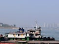 Laborers working on a boat on the Yangtze River.