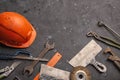 Labour day background concept - different construction tools on dark stone background with copy space Royalty Free Stock Photo