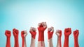 Labour day celebration with Canada national flag pattern on Canadian people clenched fist hand on sky background