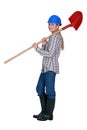 Labourer carrying a spade