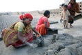 Labourers prepare bricks at a brick kiln in Sarberia, West Bengal, India