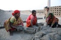 Labourers prepare bricks at a brick kiln in Sarberia, West Bengal, India