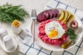 Labskaus, mashed potatoes with the beet, fried egg Royalty Free Stock Photo