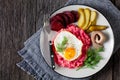 Labskaus, mashed potatoes with the beet, fried egg