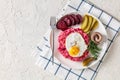 Labskaus, mashed potatoes with the beet, fried egg Royalty Free Stock Photo