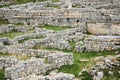 Labyrinth of remains of ancient walls on the site of a destroyed antique city Royalty Free Stock Photo