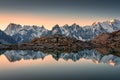 Lac Blanc with Mont Blanc mountain range and male tourist reflect on the lake in French Alps at Chamonix, France Royalty Free Stock Photo