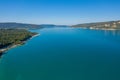 The Lac de Sainte-Croix in the middle of forests and mountains in Europe, France, Provence Alpes Cote dAzur, Var, in summer, on a Royalty Free Stock Photo