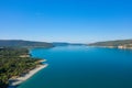The Lac de Sainte-Croix in the middle of mountains and green forests in Europe, France, Provence Alpes Cote dAzur, Var, in the Royalty Free Stock Photo