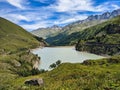 lac des toules in valais switzerland. Next to the pass road on the great Sankt Bernhard. reservoir in the mountains