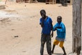 Unidentified Senegalese boys play on the street.