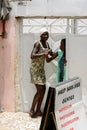 Unidentified Senegalese women talk about something.