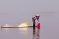 LAC ROSE, SENEGAL - NOVEMBER 13, 2019: People harvesting salt on Lac Rose or Lake Retba. Dakar. West Africa. UNESCO World Heritage