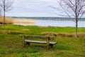 Lac Sanguinet green field beach with empty wooden bench