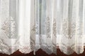 Lace curtain on the window Royalty Free Stock Photo