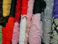 Lace of different colors in a row