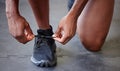 Lace shoes, sports and man running workout, cardio and wellness gym training. Closeup black man feet, runner foot and Royalty Free Stock Photo