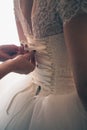 Lace wedding dress back of a young bride Royalty Free Stock Photo