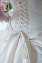 Laces on back of wedding dress