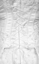 Lacing on a corset - rear view Royalty Free Stock Photo